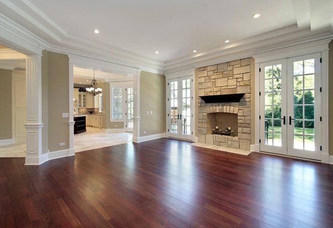 sunlit bedroom with elegant hardwood floors